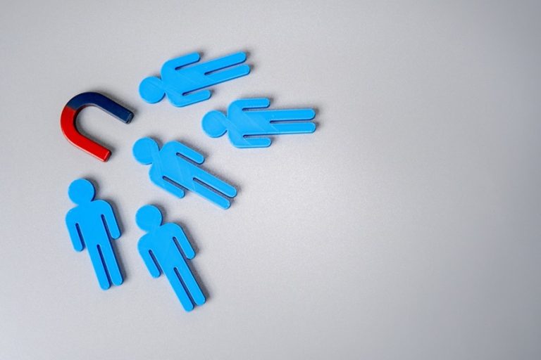 Customer retention representation using a magnet to attract people